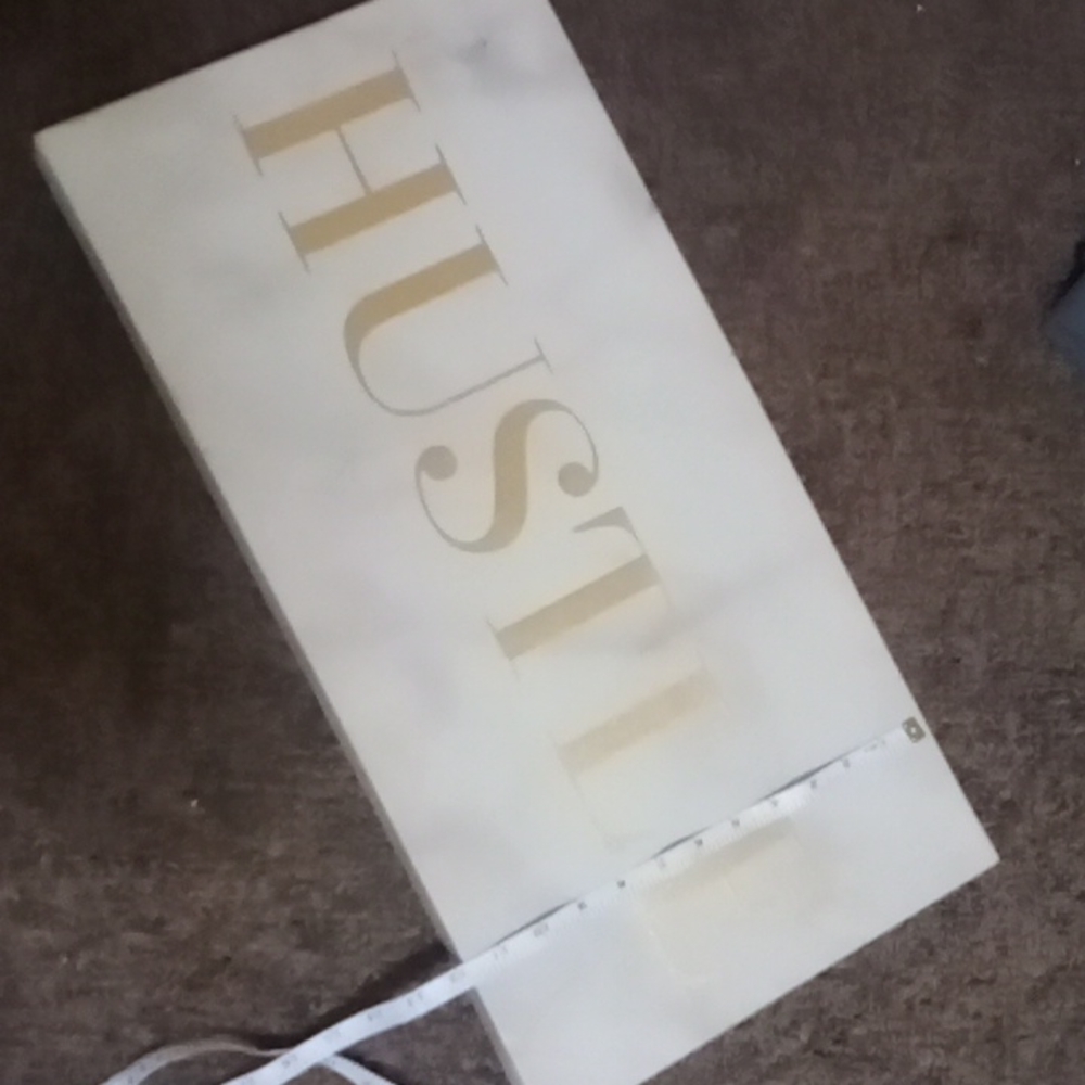 Hustle sign on canvas